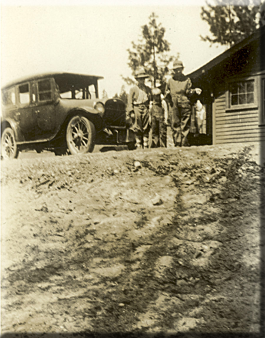 Family and old automobile