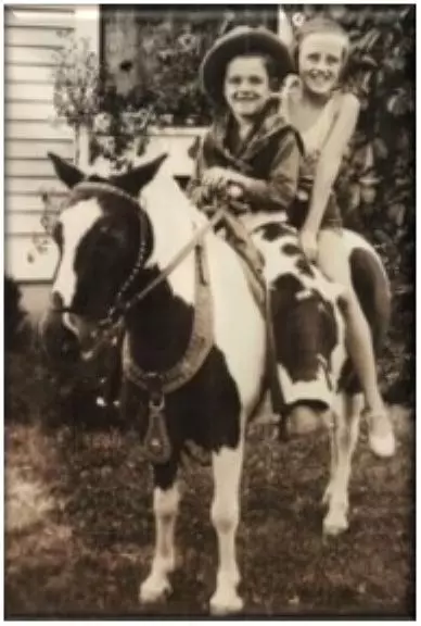 Bob and Eleanor on pony circa 1932