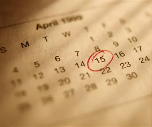 Calendar with April 15th circled in red.