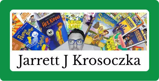 Jarrett J Krosoczka author surrounded by several of his book covers