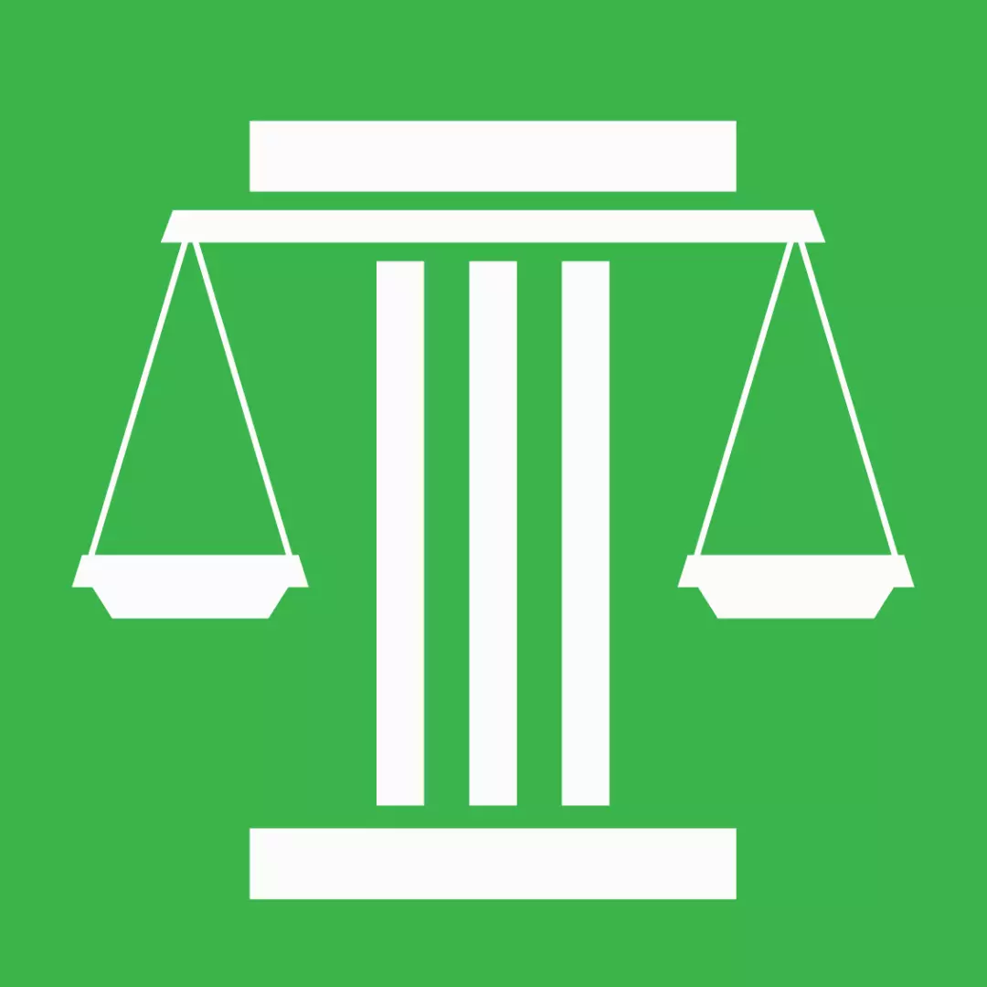 White Icon of scales of justice on green background